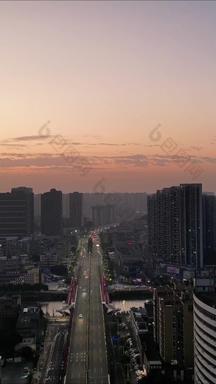 航拍广东江门城市风光日出竖版视频